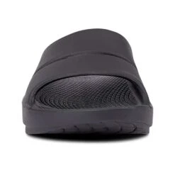 OOfos Unisex OOahh Slide - Black-Regular (D) -Shoe Sale Shop 1100BLK shot3 932x680 00bd8db1 1e6b 4cb5 9af6 228b8734257b
