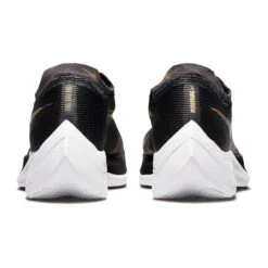 Nike Women's ZoomX Vaporfly Next % 2 Racing Shoe - Black/White/Metallic Gold Coin - Regular (B) 15 Nike Women's ZoomX Vaporfly Next % 2 Racing Shoe - Black/White/Metallic Gold Coin - Regular (B) -Shoe Sale Shop CU4123 001 PHCBH000 1500