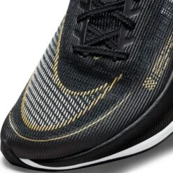 Nike Women's ZoomX Vaporfly Next % 2 Racing Shoe - Black/White/Metallic Gold Coin - Regular (B) 16 Nike Women's ZoomX Vaporfly Next % 2 Racing Shoe - Black/White/Metallic Gold Coin - Regular (B) -Shoe Sale Shop CU4123 001 PHSYD001 1500